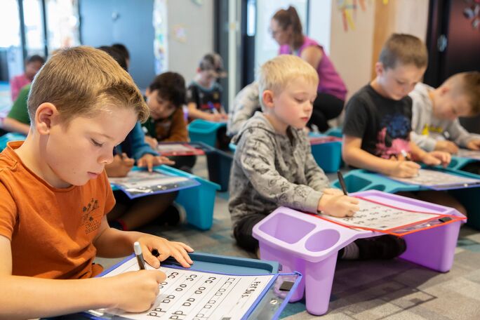 Children practicing writing